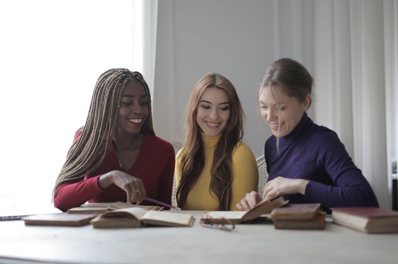 women reading book
